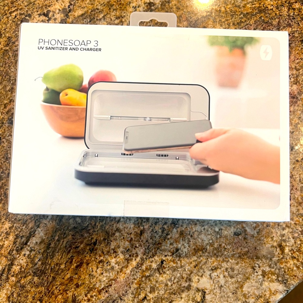 NEW IN BOX UV SANITIZER AND CHARGER PHONESOAP3. Never opened seal never broken